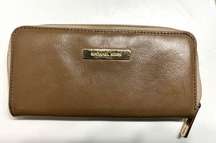 Michael Kors Camel Leather Large Zip Around Wallet
Gold emblem and gold zipper