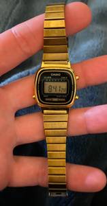 Women’s small vintage gold color watch