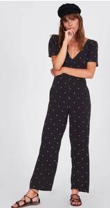 On The Bright Side Black Polka Dot Cut Out Jumpsuit