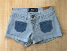 Hollister Patch Pocket Low Rise Denim Short Shorts in Blue Light Wash - Size 00