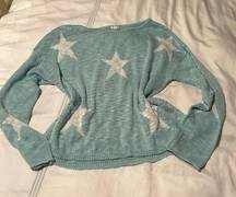 Hem and thread lightweight semi sheer pullover. Blue with white stars size small