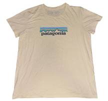 Patagonia  women’s yellow lightweight logo mountain T-shirt size small