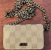 Gucci monogram canvas wallet with inside key ring. Comes with non branded chain