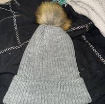 Grey beanie with Pom