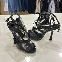 Size 7 clear pvc  heels with oxford style black leather.