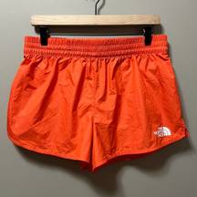 The North Face  women’s Orange athletic shorts size Medium‎