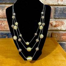 C1946 triple strand gold tone beaded necklace
