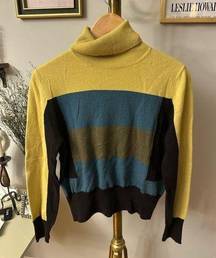 Long sleeve wool/cashmere/angora/silk blend sweater by Akris Punto size large