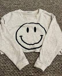 smiley face cropped sweater 