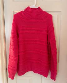 pink knit sweater