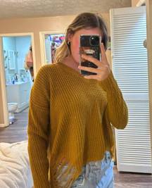 distressed sweater