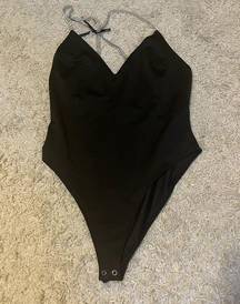 Forever 21  black rhinestone open back bodysuit size medium