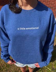 Blue crewneck sweatshirt a little emotional