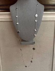 Melinda Maria Long shiny silver tone necklace with hammered silver discs. NWOT