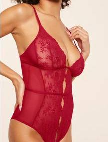 The lady in red lace lingerie bodysuit