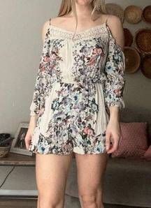 Floral romper cut out shoulders size small