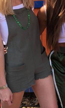 green tie shorts overalls romper