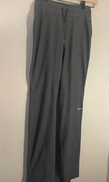 NIKE dri fit black pants with zippers at the bottom ankle and back pockets EUC