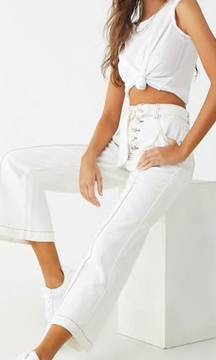 WHITE FLARED JEANS WITH RED STITCHING