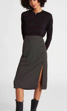 NWOT- So cute pencil skirt, black with small polka dots, front off side buttons with slit, back waistband is elastic, excellent condition, never been worn, size medium (8)