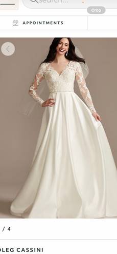 Oleg Cassini long sleeve satin applique wedding dress