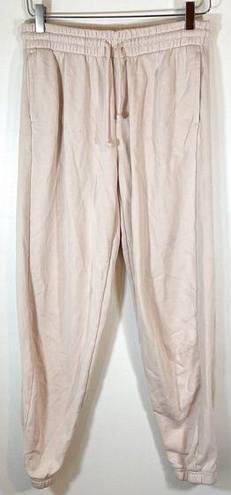 Aritzia tna airy fleece sweatpants light pink high rise pockets drawstring sz M Size M