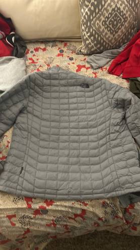 The North Face  Grey Puffy Jacket 