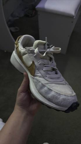 Nike white and gold  debuts