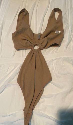 Anwnd tan/light brown body suit size M/L