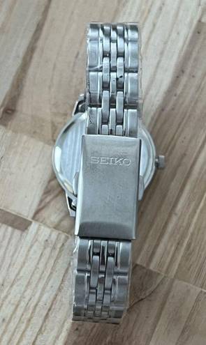 Seiko  Ladies Watch Black Dial with Train motif Stainless Bracelet and hands