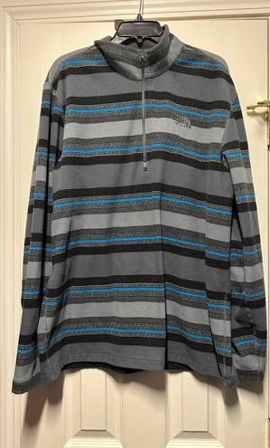 The North Face Striped Sweater is a Men’s size XL.