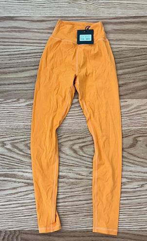 Meshki Orange Leggings