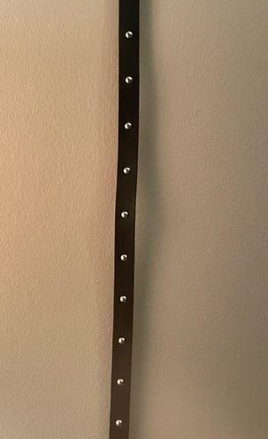 Levi’s  black studded belt with silver accents