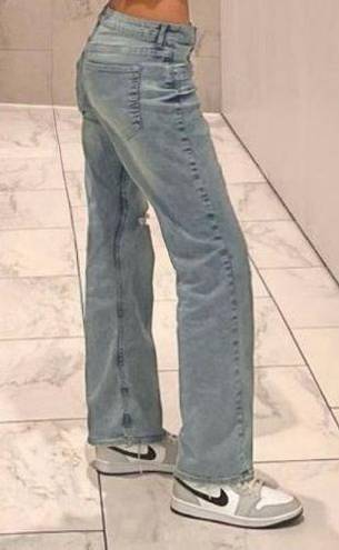 Loft Light Wash Flared Jeans - with rip