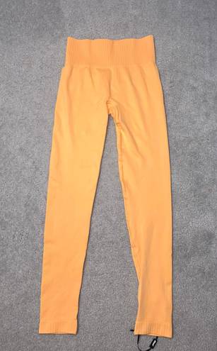 Bo and Tee NWOT  Orange Leggings Size Small