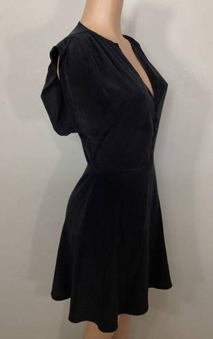 Equipment New.  black silk fit and flair dress. Small. Retails $398