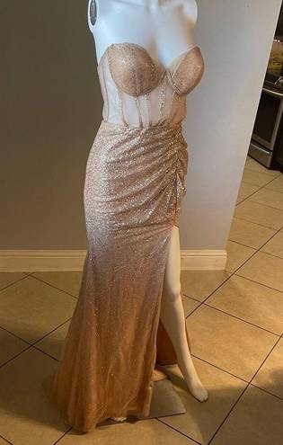 Cinderella Divine Women’s formal sparkly dress size 4
Brand is 
Rose gold color