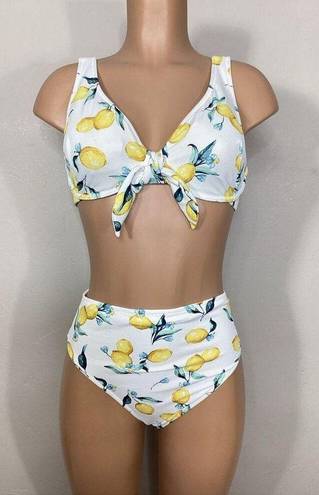 Jessica Simpson New.  lemon bikini. (D-cup) M-top/L-bottom.  Retails $119