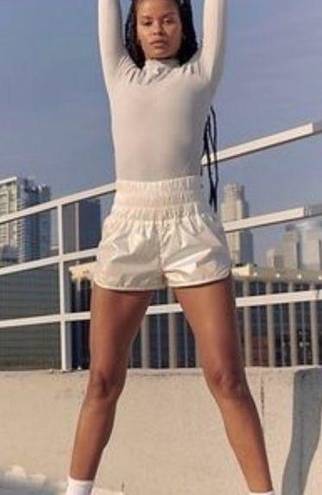 Free People  Movement Way Home Shine Irridescent White Shorts Size Small RARE