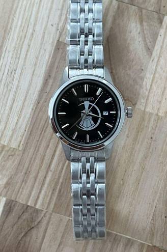 Seiko  Ladies Watch Black Dial with Train motif Stainless Bracelet and hands