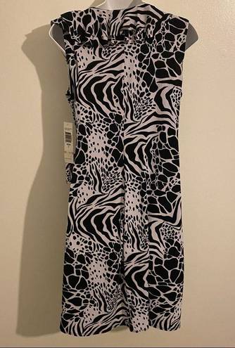 Tiana B . Black and White Sleeveless Wrap Around Dress 🆕 size large