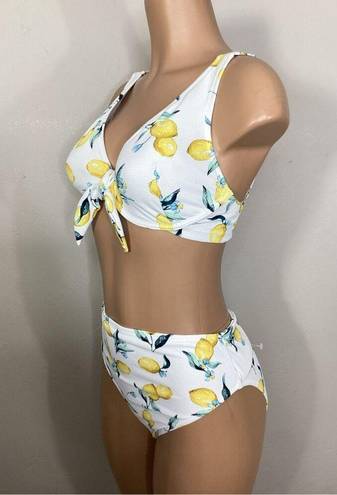 Jessica Simpson New.  lemon bikini. (D-cup) M-top/L-bottom.  Retails $119