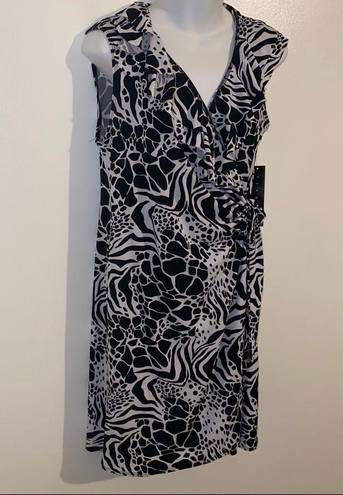 Tiana B . Black and White Sleeveless Wrap Around Dress 🆕 size large