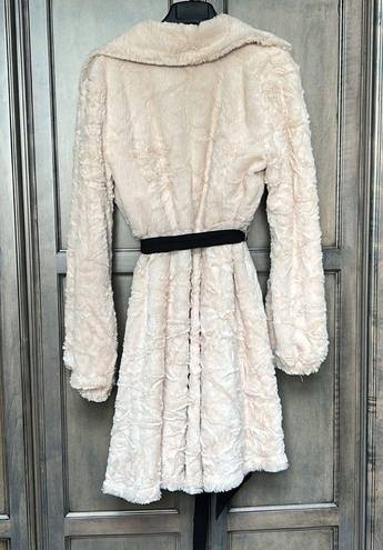 Hazel trench style coat. Cream furry material with black silky ribbon belt. Size L