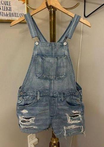 American Eagle  light wash distressed denim short overalls size small