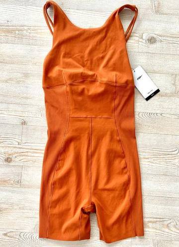 Nike New  Yoga Dri-Fit Luxe 5" Jumpsuit | Dark‎ Russet Orange Size M