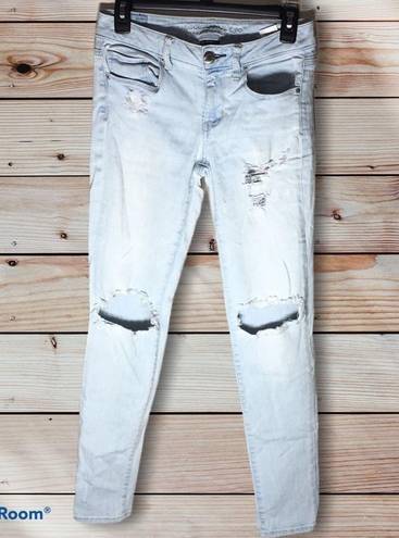 American Eagle  distressed skinny jeans size 4 light wash color holy jeans​​