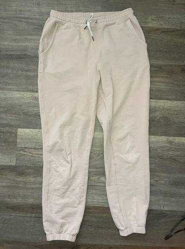 Vuori  light pink women’s joggers sz XS oversized *flaw*