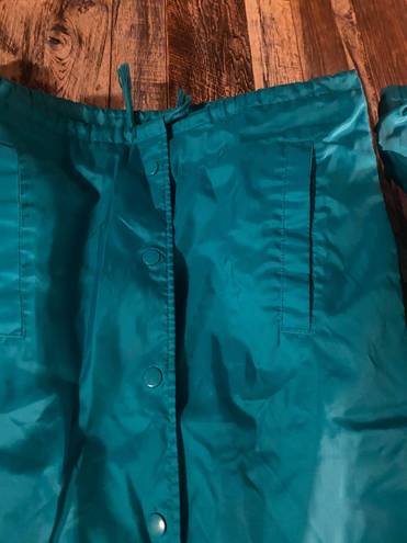 Champion wind breaker / raincoat women's or men size XS. Green