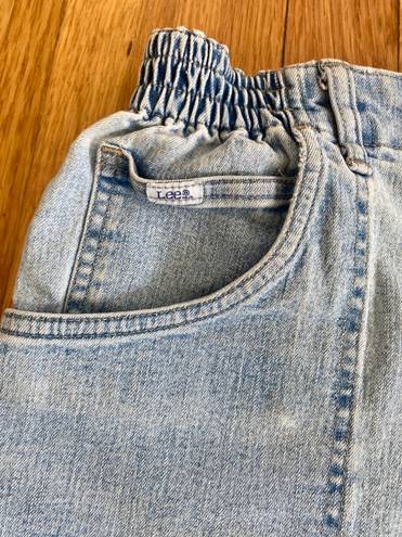 Lee y2k vintage  denim shirts, fits women’s M/L, apx size 8/10, has stretch band waist that is elastic, 14.5” band laying flat but can stretch quite a bit, 5” inseam beautifully distressed